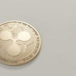 photo of round gold colored coin